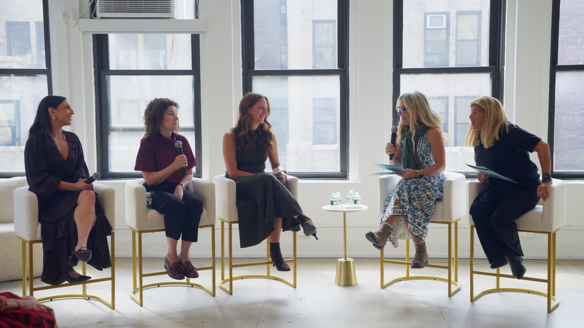 The three expert panelists and Every.Body.Talks hosts in conversation at the live recording of Living in the Middle